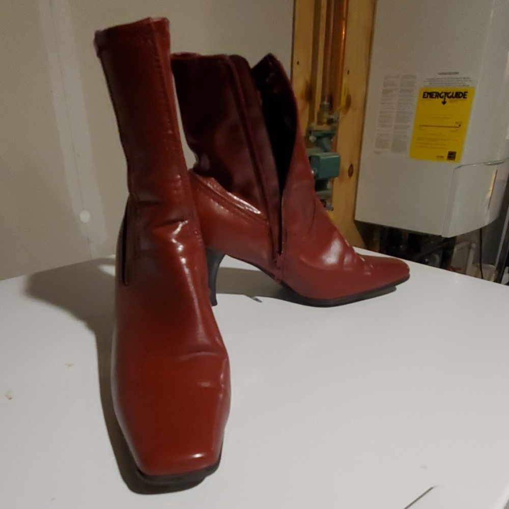 Red shiny boots.